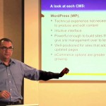 Carlos Perez teaching WordPress class on comparing CMS systems